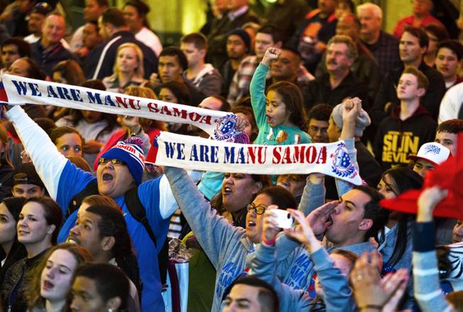 USA Sevens International Rugby Tournament fans for team Samoa cheer for their players during opening ceremonies at the Fremont Street Experience on Thursday, Jan. 23, 2014.